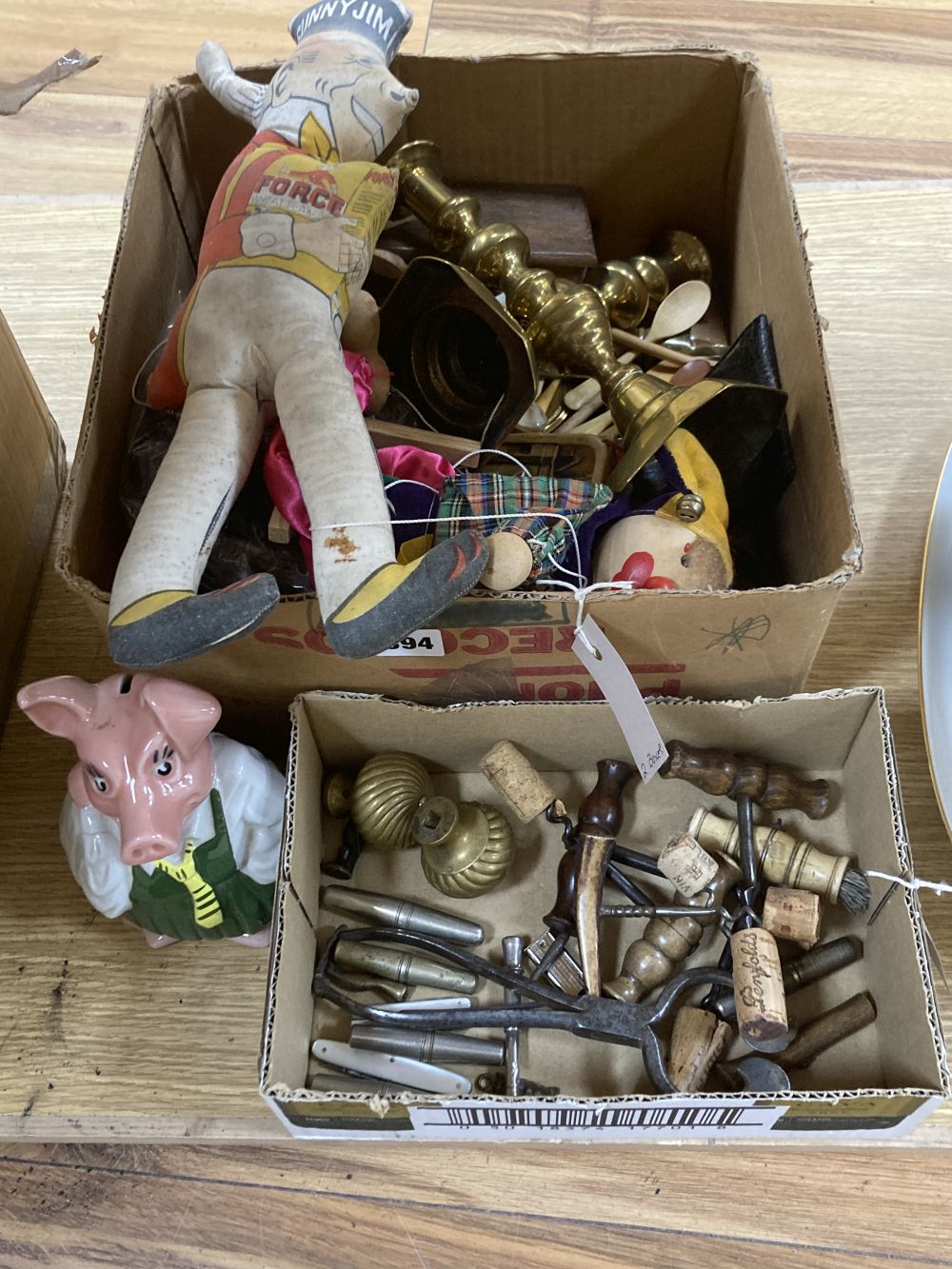 A group of cork screws, pen knives and pipe tampers